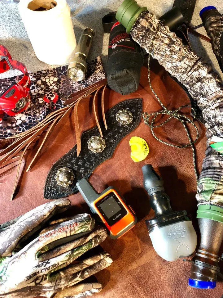 Getting geared up for an archery hunt.